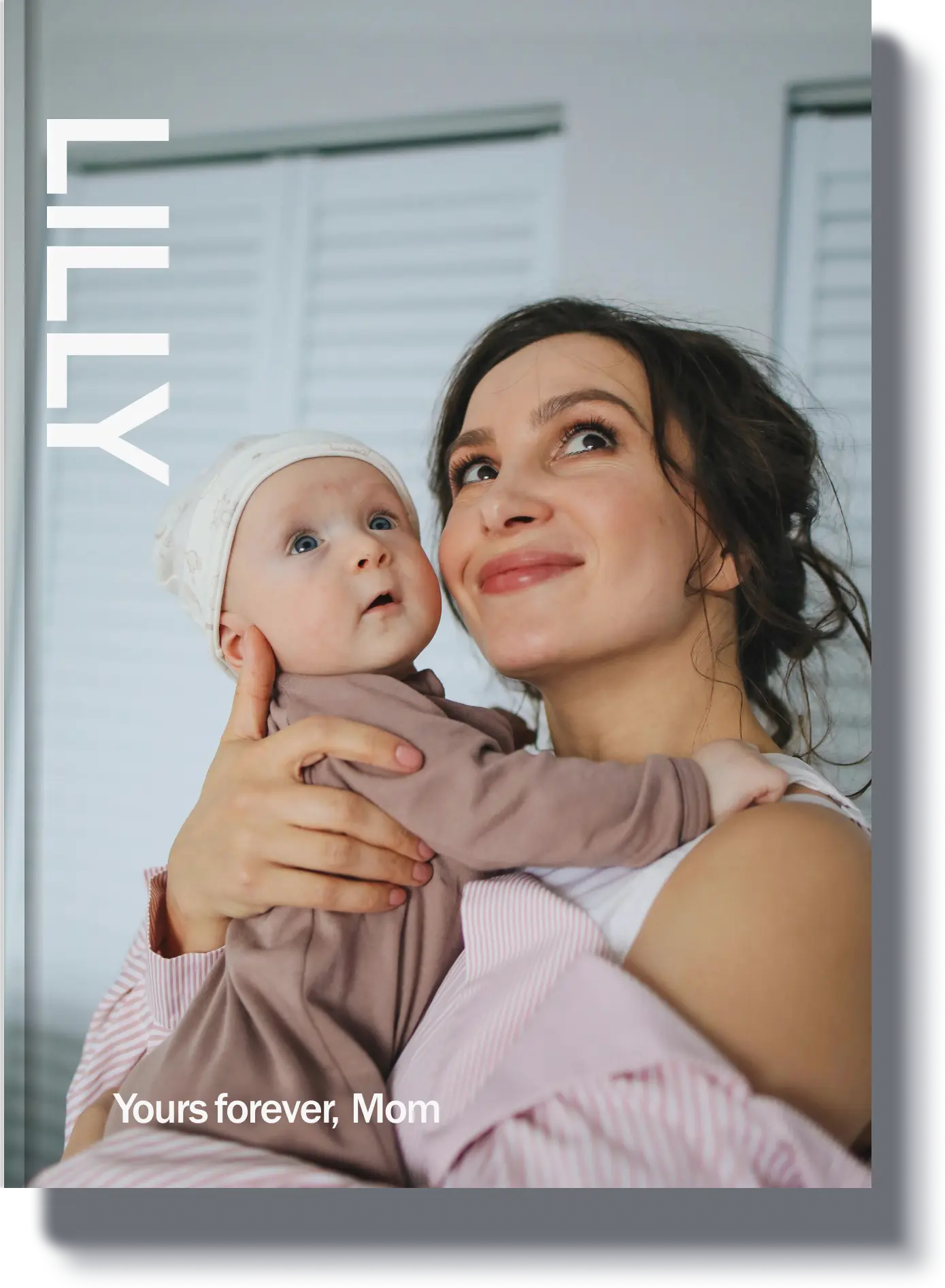Lilly - A childhood memory book featuring a mother holding her baby, capturing precious moments from the early years.