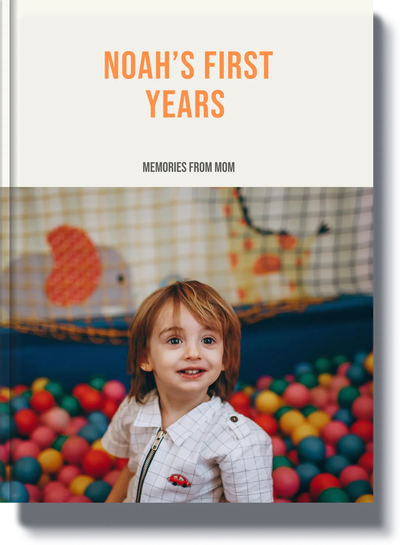 Noah’s First Years - A childhood memory book featuring a joyful young boy in a play area, preserving memories from his early years.