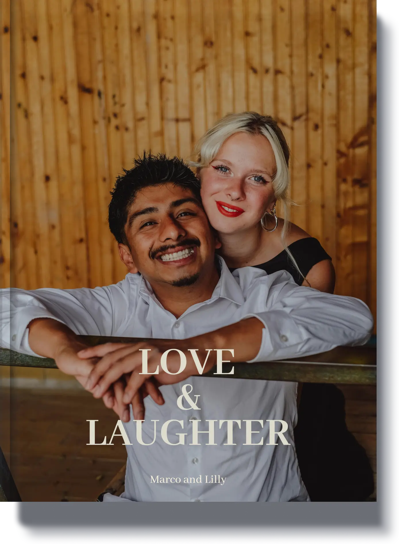 Book cover titled 'Love & Laughter' featuring a happy couple, a personalized couples book capturing fun and romantic moments.