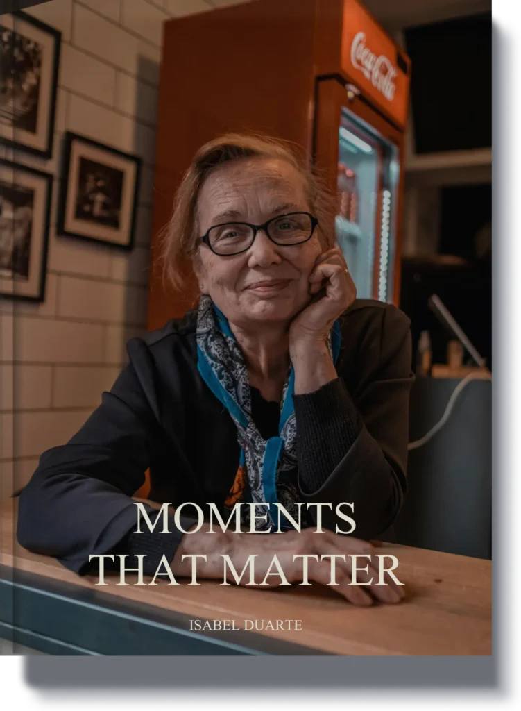 Custom Mother’s Day book titled 'Moments That Matter,' featuring a loving mother reflecting at a café, a heartfelt keepsake for celebrating her life and memories.